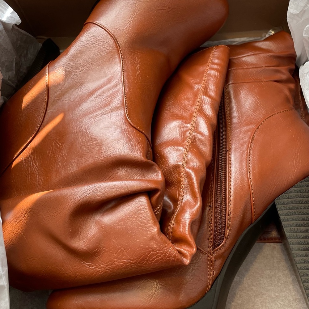 Michael Shannon caramel color leather heel boots.